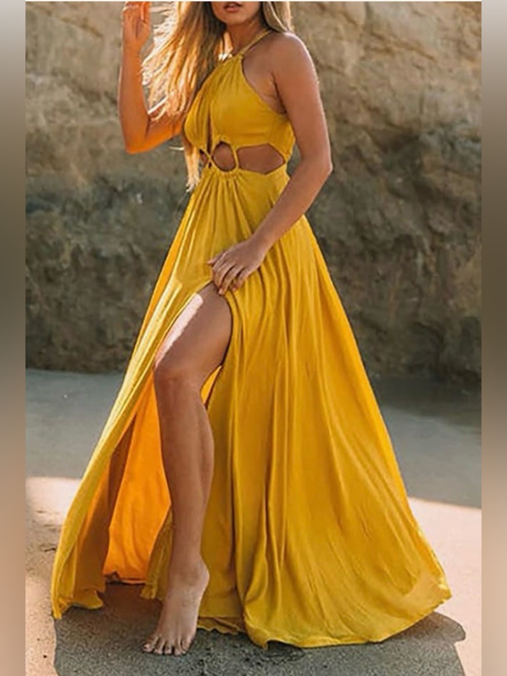 Halter dress w/ cutouts around waist. Front slit Stretchy waist. Subtle yellow M